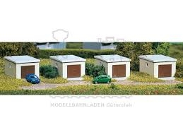 AUHAGEN kit en plastique de 4 garages( chacun 65x48x25mm) Batiments