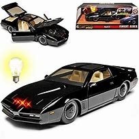 JADA 1/24 PONTIAC TRANS AM W /LED  HEAT Black 1982 By Heroes / Collections