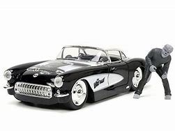 JADA 1/24 CHEVROLET CORVETTE W /WOLFMAN figure black 1957 Par Héros / Collections